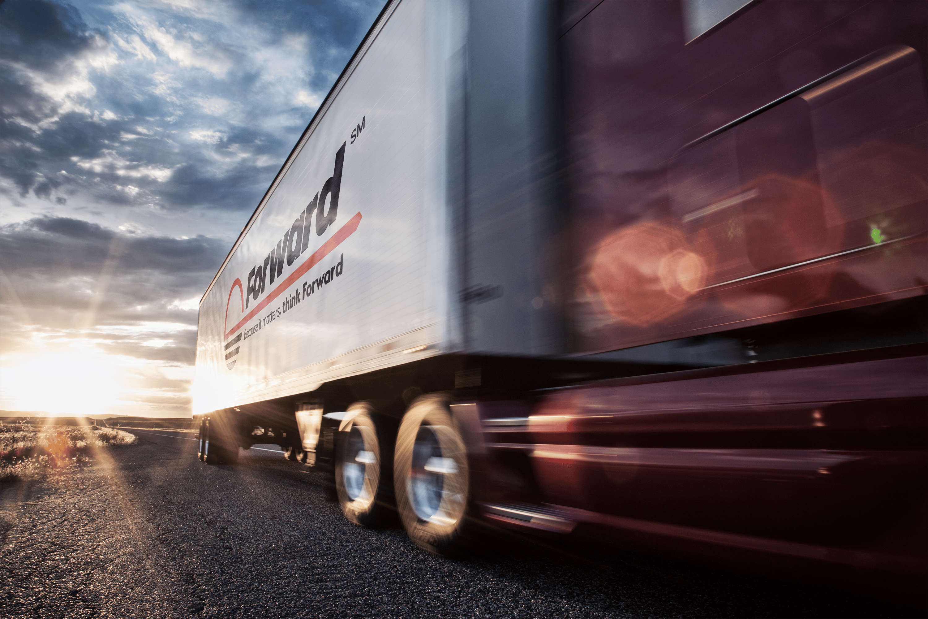 Forward Air truck with gray sky